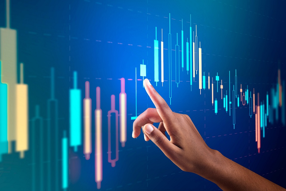 Stock market chart on virtual screen with woman’s hand digital remix